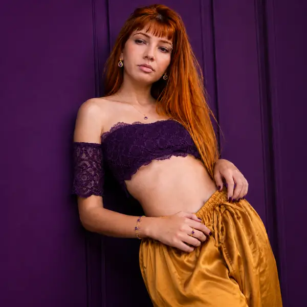 Model Camelia wearing amethyst jewelry from Solenne